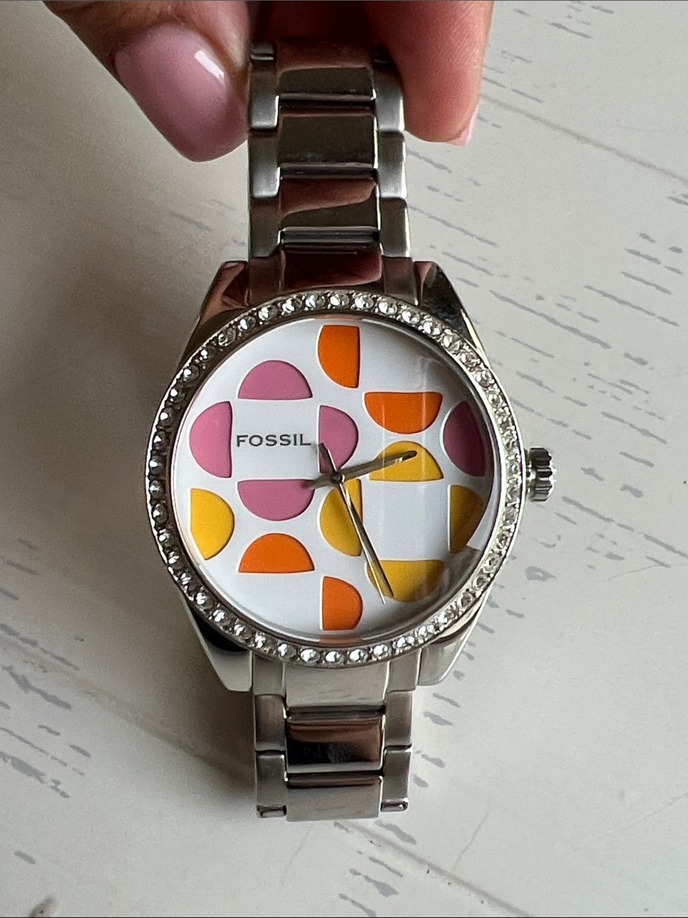 Fossil woman’s silver watch / colorful design with diamonds